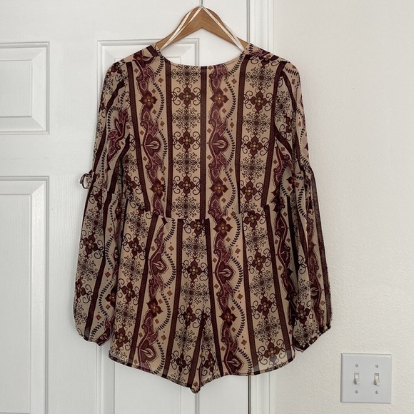 Forever 21 long sleeve boho jumpsuit with plunging neck line. - Picture 5 of 13